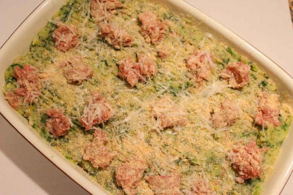 Potato & Sausage Casserole, decorate top with small pieces of sausage mince